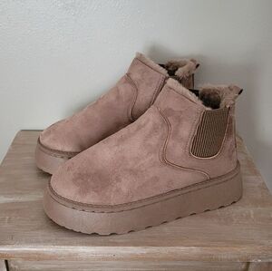 Brown faux fur lined slip on boots